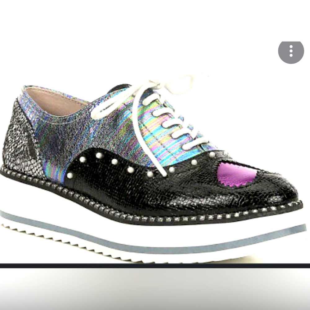 Betsey Johnson Marti
NEW Multi-Print Studde...
BETSEY JOHNSON.
Size 8 1/2.